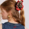 frill scrunchie in leopard with red edge