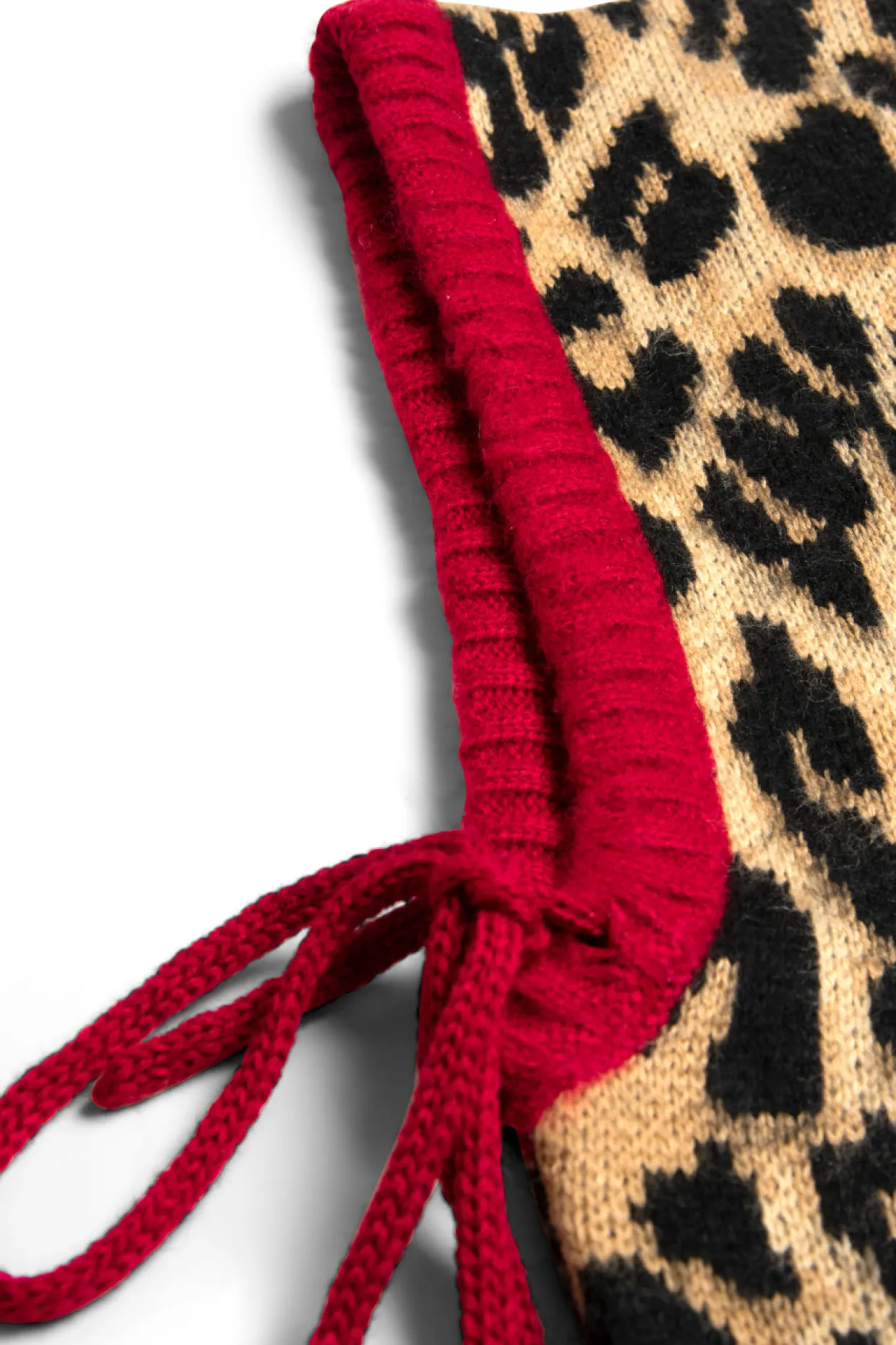 hood in leopard with red tie